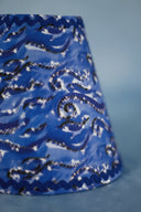 L’abat-jour pince-flamme Les Vagues